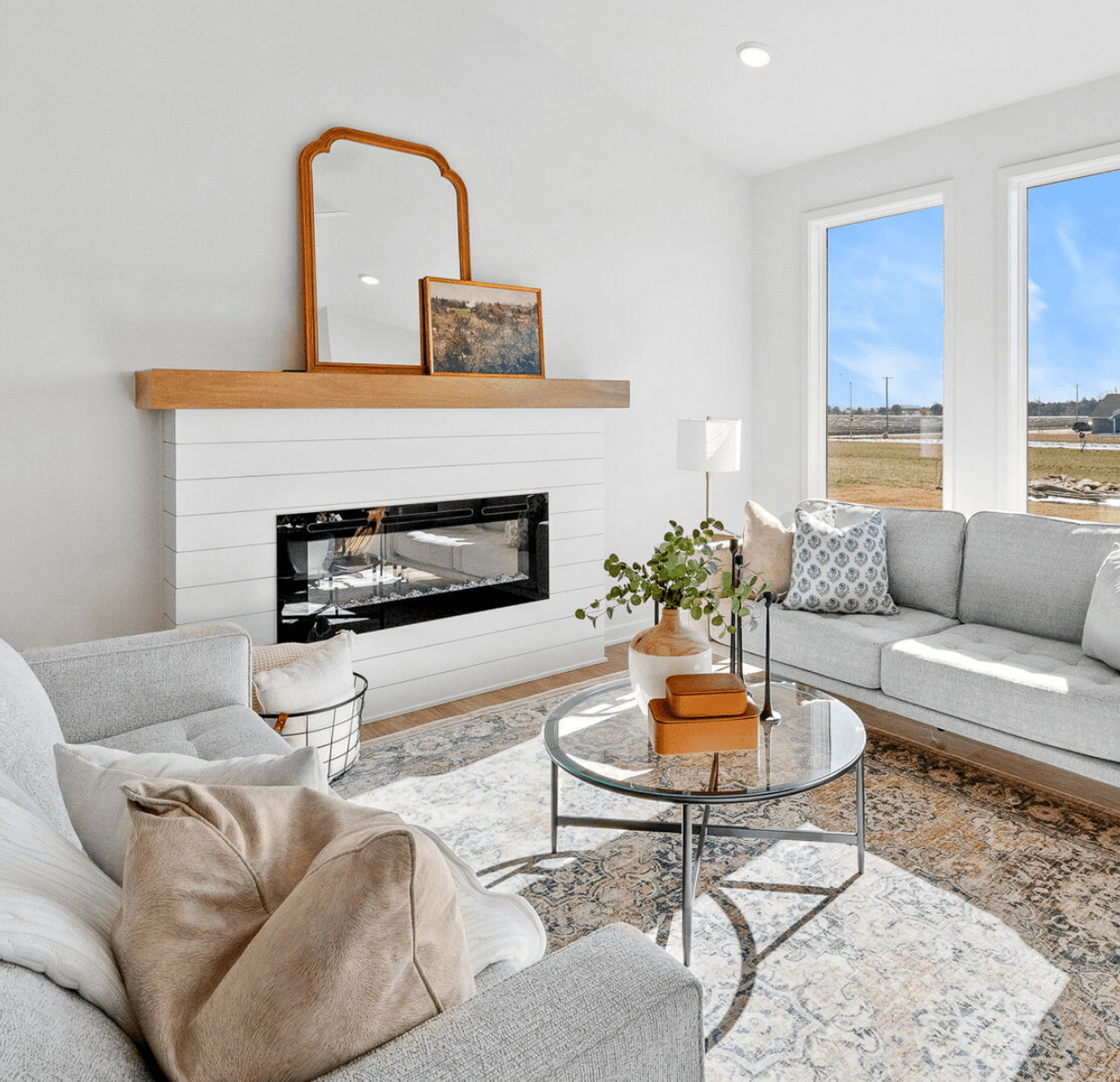 a bright living space with large windows